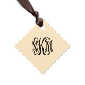 Our custom Natural Black Round Gift Tag with Satin Sterling Silver Foil can't be beat. Showcase your style in every detail of your party's theme!