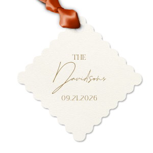 Add a personalized touch to your wedding favors with the Boho Terracotta Wedding Date Gift Tag. This tag begins with "The" in a stately serif font, followed by the newlyweds' surname in a graceful script. Finalize this bespoke detail with the date of your special day, all in the same classic font, capturing the essence of your chic and moody fall celebration.