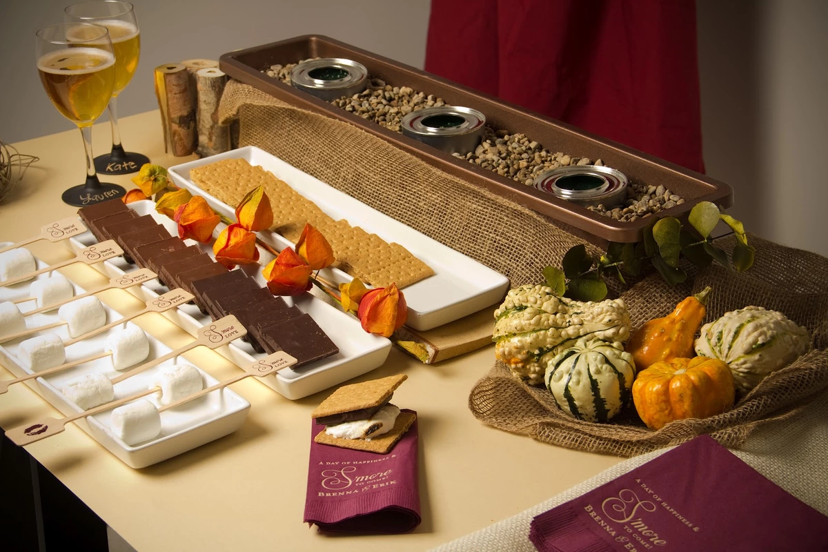 DIY S'more bar with personalized napkins and personalized food skewers