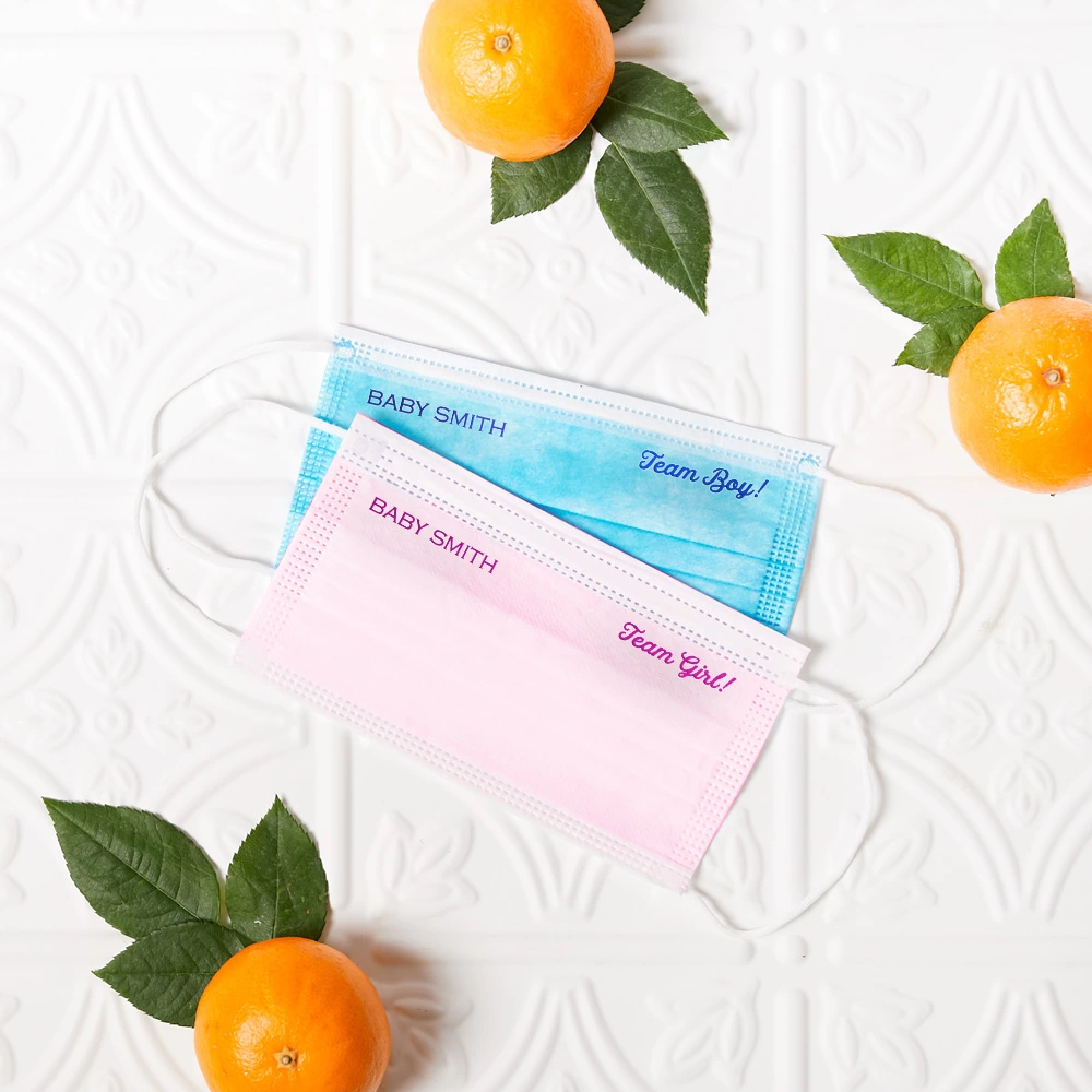 Create a gender guessing game at your fall baby shower with pink and blue face masks