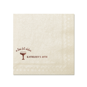 Embrace the whimsy with the A Tini Bit Older Birthday Napkin, featuring a chic, hand-drawn martini glass. The phrase "A tini bit older," scripted above the illustration, brings a playful note to the celebration. Customize beside the glass with your name and the milestone birthday in a classic serif font, adding a personal and stylish twist to your festivities.
