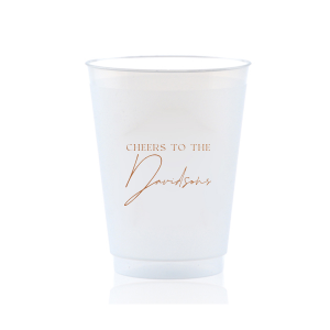 Raise a toast with the Boho Terracotta Cheers to the Wedding Cup, where rustic meets refinement. The phrase "Cheers to the" is beautifully presented in a classic serif font, inviting you to inscribe the couple's surname below in a sophisticated script. A cup that embodies the warmth and subtle drama of your autumnal nuptials.