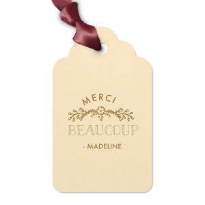Elevate your gifting experience with our exquisite personalized gift tag, crafted using the timeless art of letterpress printing. This tag embodies elegance with a charming "Merci Beaucoup" message, perfect for expressing gratitude.