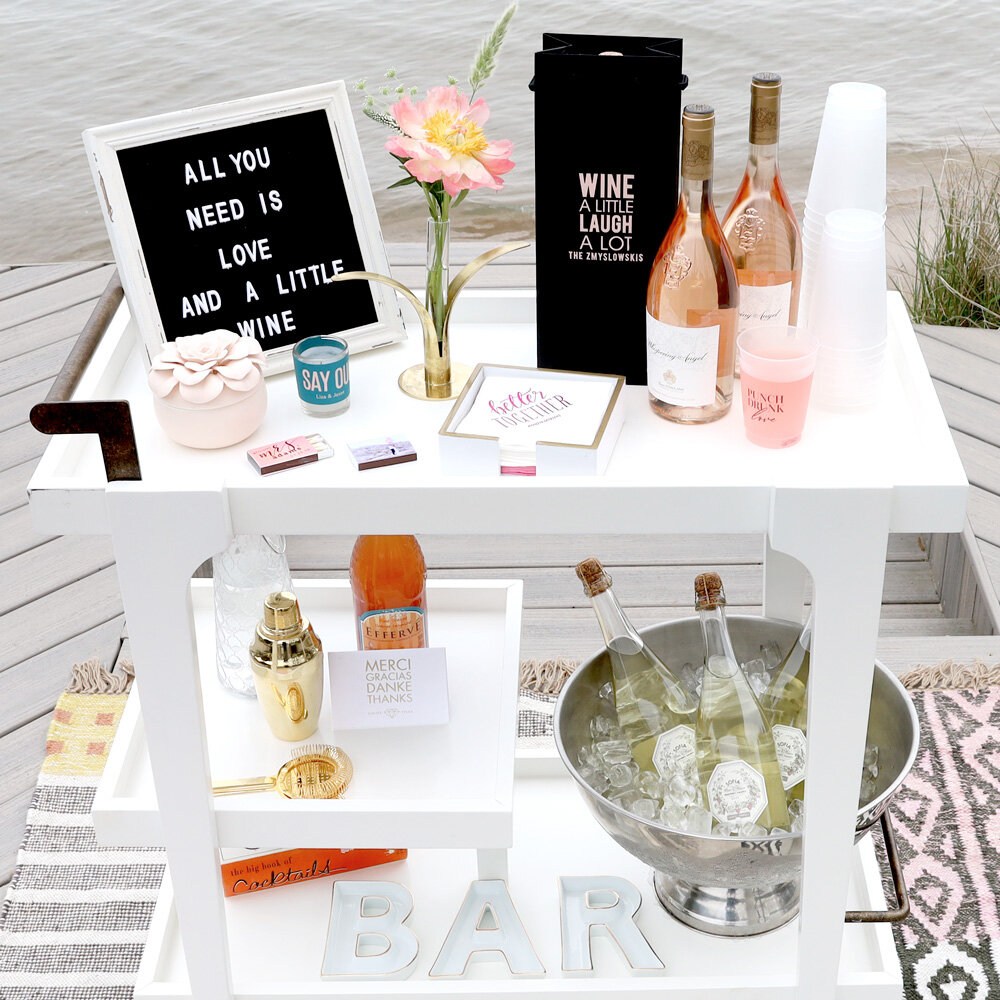 stocked bar cart complete with message board