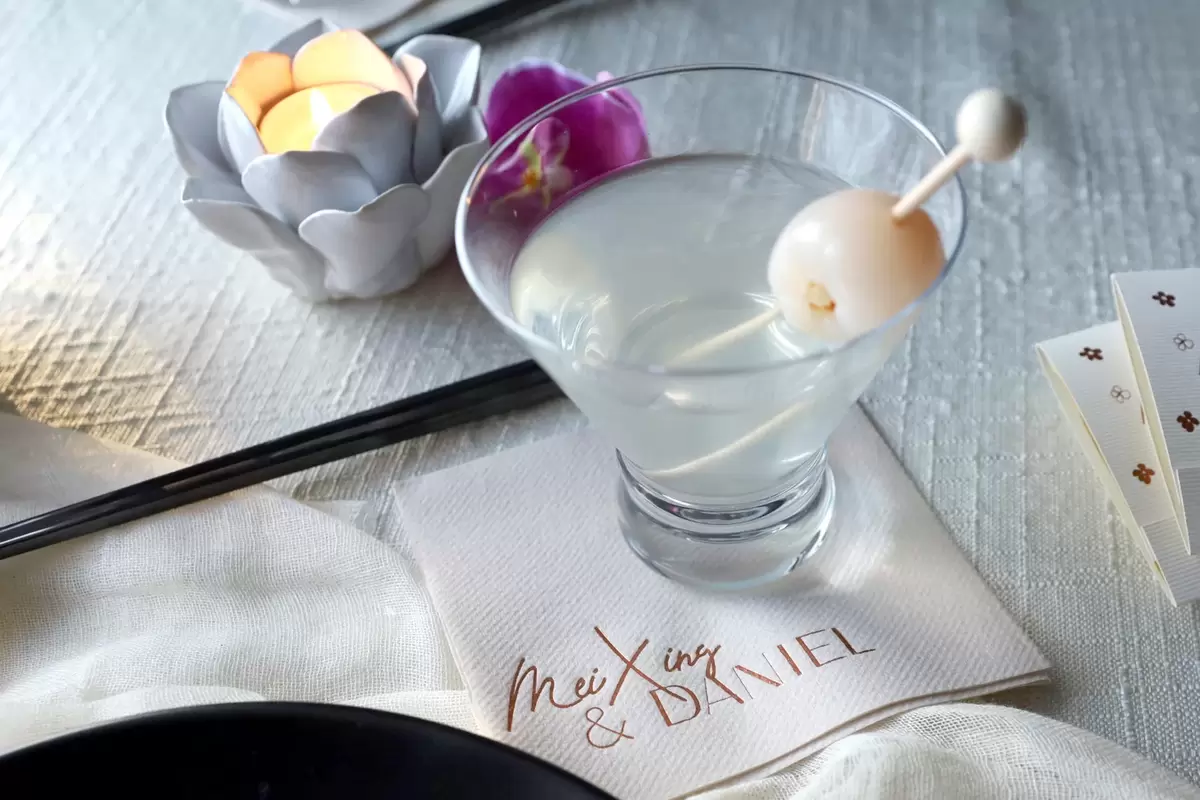lychee martini with custom cocktail napkin