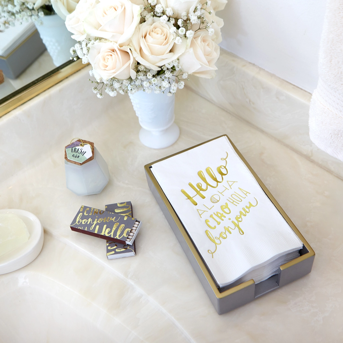 gift set with towels and candle and matches