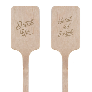The Celebration Script Stir Stick marries the elegance of your and your partner's names in a bold, timeless typeface on one side, with a cheerful 'Drink Up' message on the other. This stir stick invites guests to enjoy their libations while honoring the couple of the hour. It's a classic addition to any toast at weddings, anniversaries, or engagement parties.