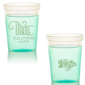 Add a touch of elegance to any gathering with the Family Name Flower Cup. Featuring a beautifully flourished "THE" that artistically highlights your family name and a single peony graphic on the reverse, this design is perfect for weddings, family gatherings, or simply celebrating togetherness with style.