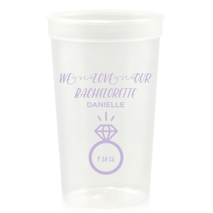 Raise a cup to the guest of honor with the Bachelorette Engagement Cup, where love and diamonds meet in celebration. Above the glinting solitaire, 'We Love Our Bachelorette' sets off the cheers, with her name leading to the ring that playfully hugs the date.