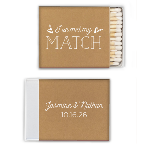The I've Met My Match matchbox is a charming celebration of companionship and growth. The design features "I’ve met my" in script, flanked by hearts, and "MATCH" in a playful font, symbolizing a perfect pairing. The reverse side, with the couple's names and the event date, further personalizes this testament to a relationship that embodies the essence of meeting one's true match.