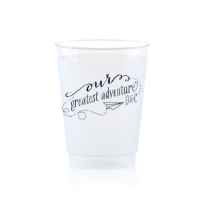 Embark on a journey of celebration with the Our Greatest Adventure Couples Cup. This imaginative design features a paper airplane soaring from "our" into a swirling adventure around "greatest adventure," accented by the couple's initials. Perfect for adding a splash of excitement and movement to your party!