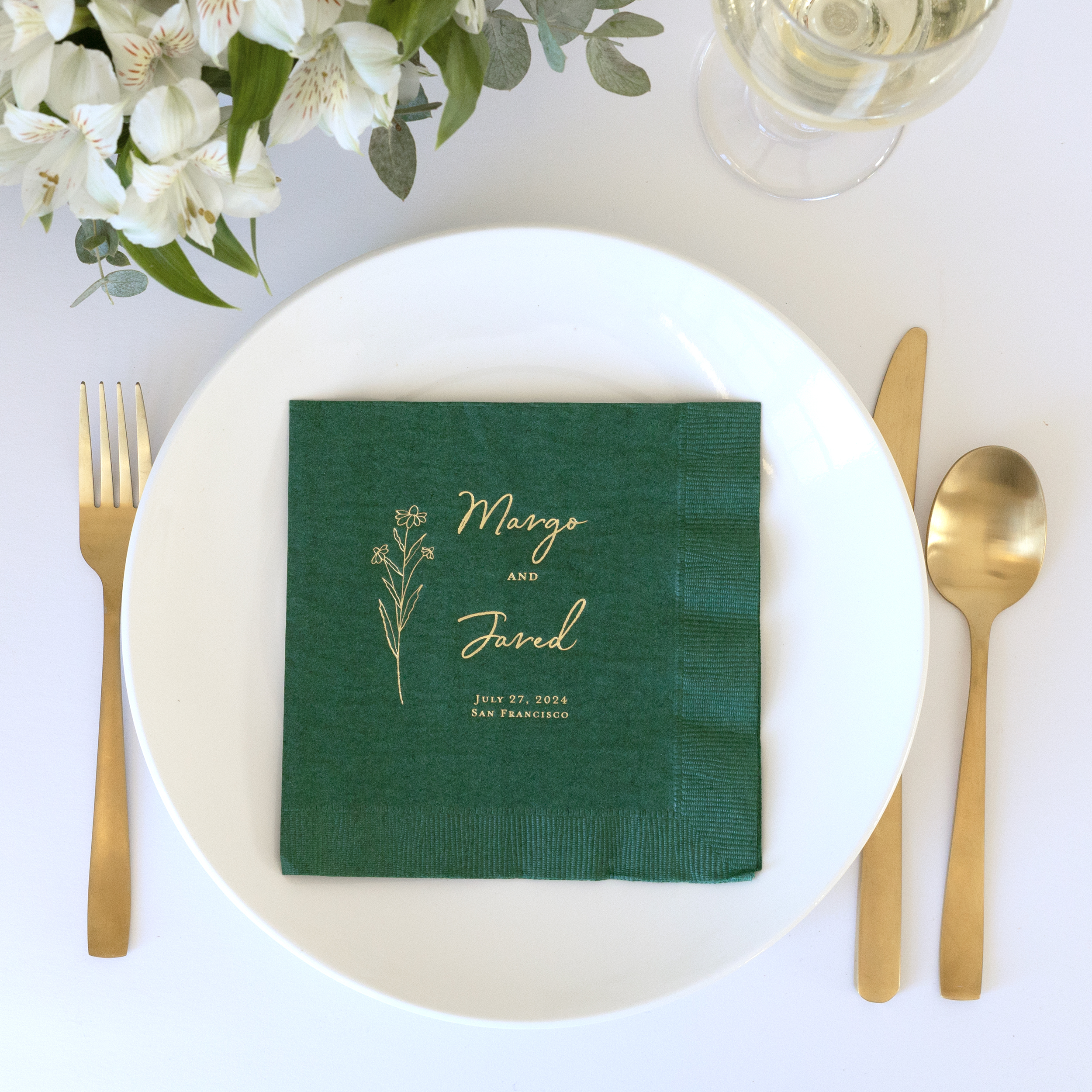 Green printed Lunch Napkin on a plate