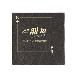 Mark a royal celebration with the Spades Playing Card Still All In Anniversary Napkin. Your initials form the centerpiece within the spade graphic, encircling the confident "Still All In" statement, with the notable anniversary year below in an elegant script. Personalize further by adding the couple's name at the bottom, crafting a regal and romantic accent for your anniversary event.