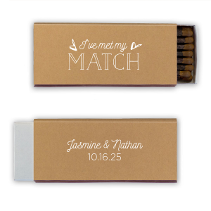 The I've Met My Match matchbox is a charming celebration of companionship and growth. The design features "I’ve met my" in script, flanked by hearts, and "MATCH" in a playful font, symbolizing a perfect pairing. The reverse side, with the couple's names and the event date, further personalizes this testament to a relationship that embodies the essence of meeting one's true match.