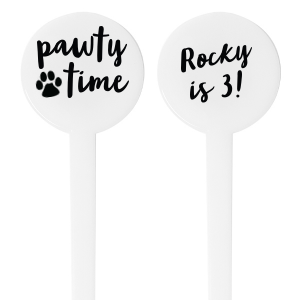 The Pawty Time Stir Stick celebrates milestones with a customized declaration perfect for adding a personal touch to your, your child's, or your pet's special day. The reverse side features an adorable paw print graphic with the playful words "Pawty Time," also in the same relaxed script, setting the tone for a fun-filled event. This charming stirrer is a delightful accessory for birthday parties, pet adoption anniversaries, or any occasion worth throwing a "pawty" for.