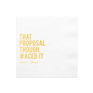 The That Proposal Though Napkin playfully celebrates a perfectly executed engagement plan. Emblazoned with "THAT PROPOSAL THOUGH. #ACED IT," it humorously nods to the elaborate productions of modern proposals. The couple's names add a personal touch, making this design a charming memento of a successful Proposal! 