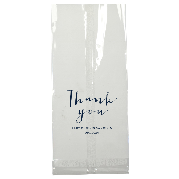The Grateful Thank You Bag displays a heartfelt 'Thank You' in bold, centered script. Below, the couple's names and event date add a personal touch. This clear cellophane bag, ideal for wedding favors, combines simplicity with gratitude, offering a timeless token of appreciation.