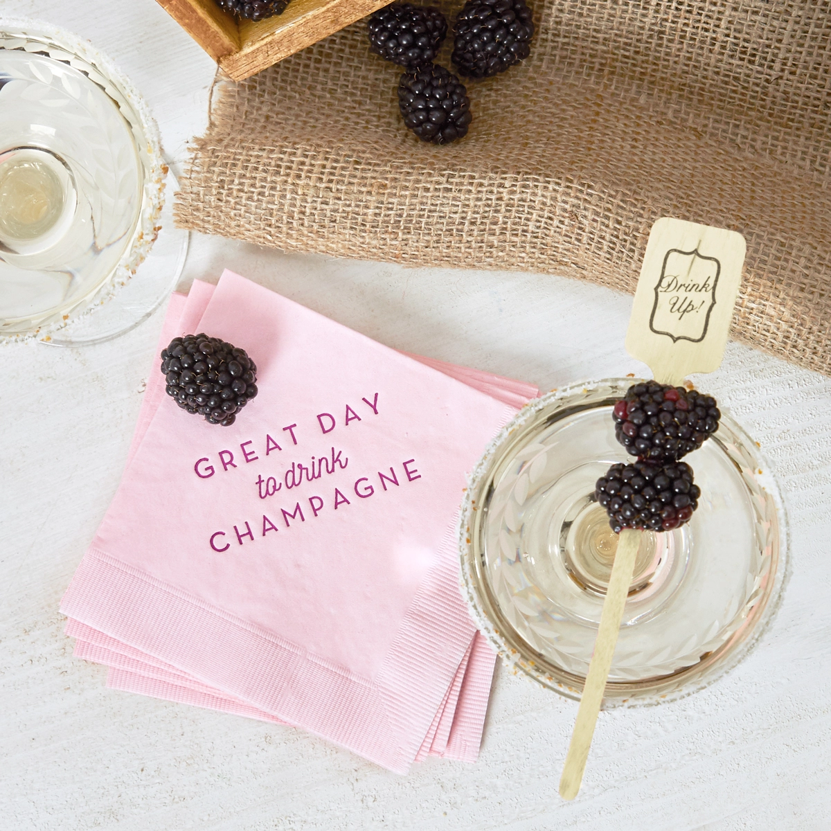 blackberry champagne with personalized cocktail napkins
