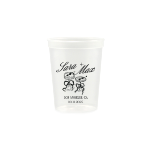 The Wedding Glass & Bow Cup is the must have trendy design for your one of a kind lifetime event. Featuring hand-drawn bows tied around champagne glasses alongside customizable text in the screen printed ink color of your choice to best pair with your party's vibe.