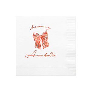 Celebrate the bride-to-be with the Showering Love Bow Napkin, delicately personalized with her name in a romantic script, alongside the word "showering" and a stylish bow graphic. An elegant choice for a chic and trendy bridal shower.