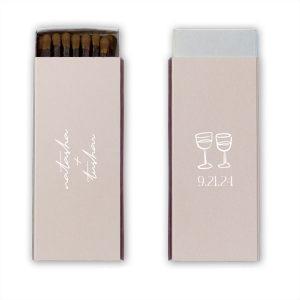 Light up your autumnal love story with the Boho Terracotta Line Art Wedding Matchbox. Customize one side with the couple's names elegantly scripted, symbolizing unity. The other side is adorned with a minimalist line drawing of two clinking wine glasses, topped by the wedding date in a refined serif font, ready to commemorate your chic, moody celebration.