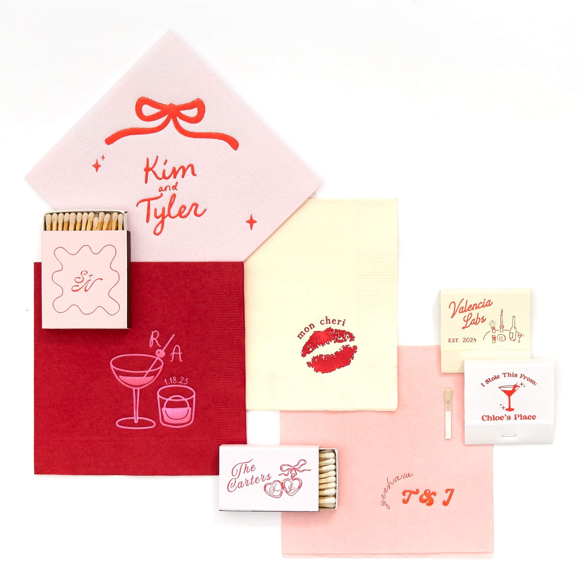 Collection of custom foil printed napkins and matches