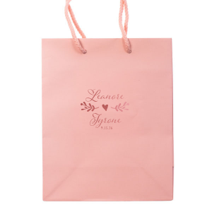 Cherish the union of love with the Heartfelt Wedding Fancy Script Names Bag. It beautifully showcases the couple’s names in sweet, fancy script, united by a whimsical bough culminating in a central heart. Below, the event date adds a final touch, symbolizing the joining of two lives into one heartfelt journey.