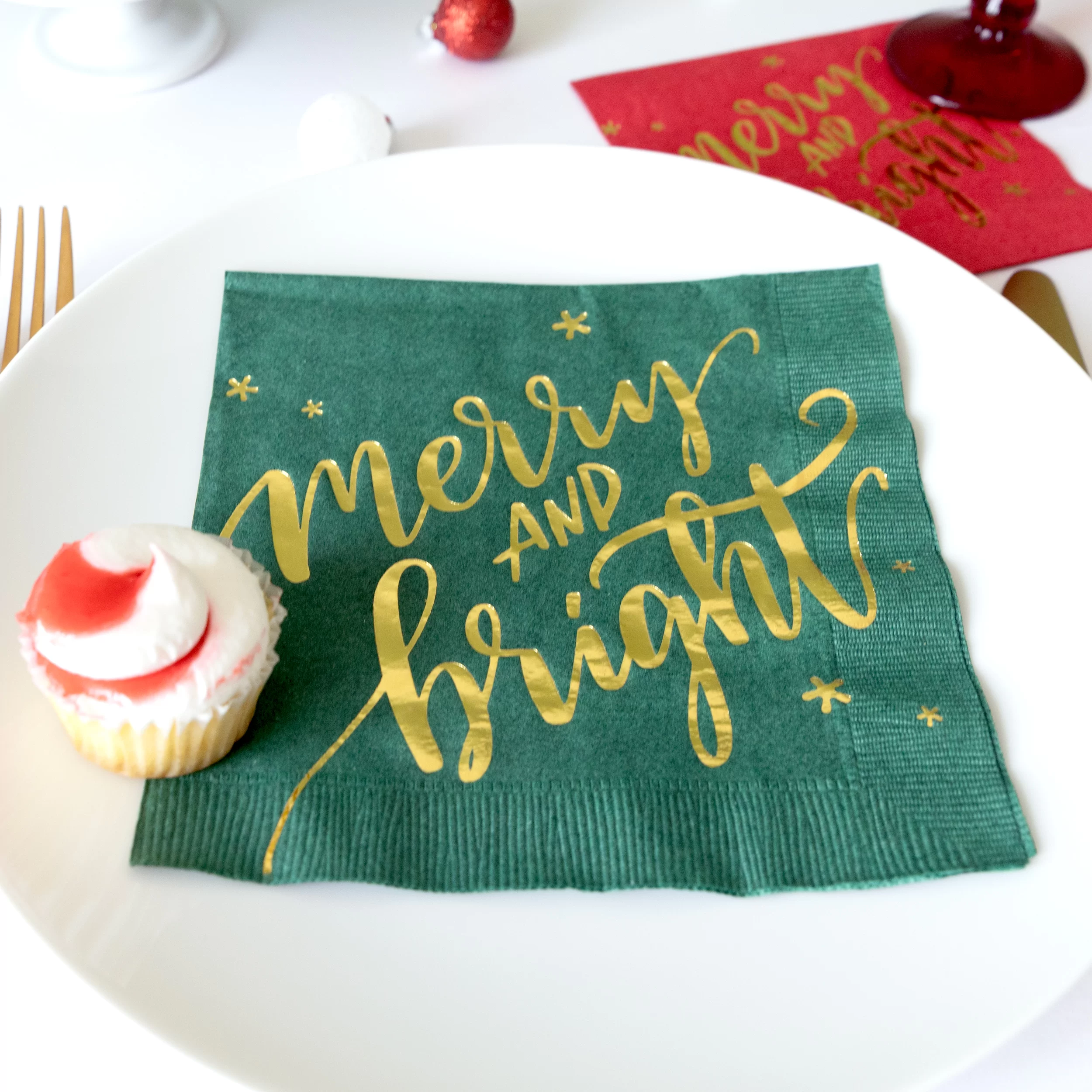 Green and gold holiday paper napkin