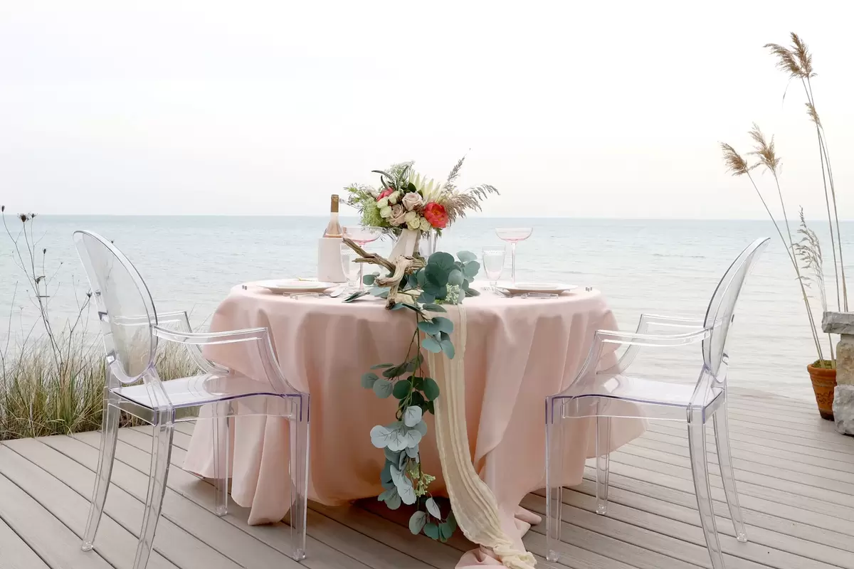 gorgeous sweetheart table beside water