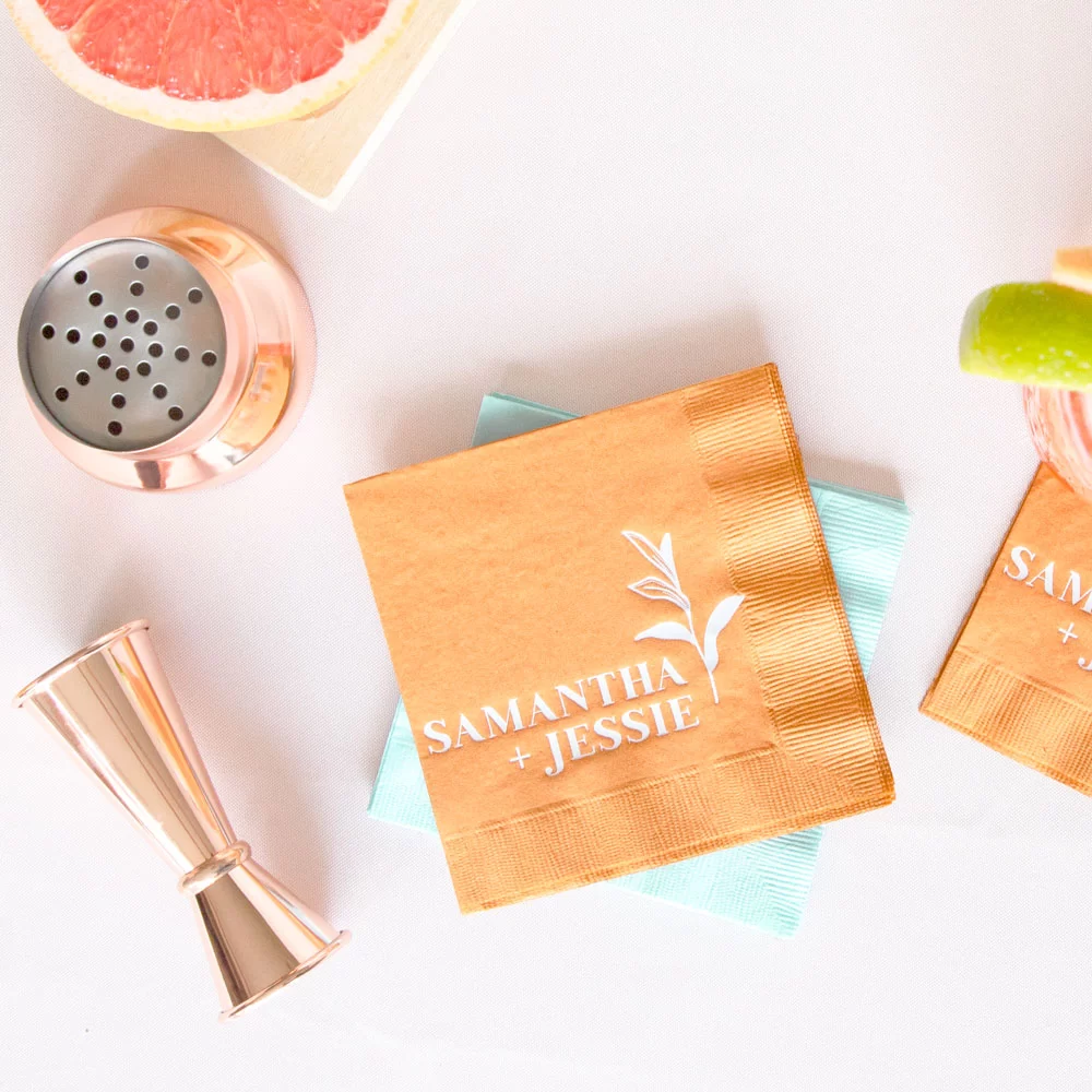 custom cocktail napkins add a personalized detail to your wedding bar
