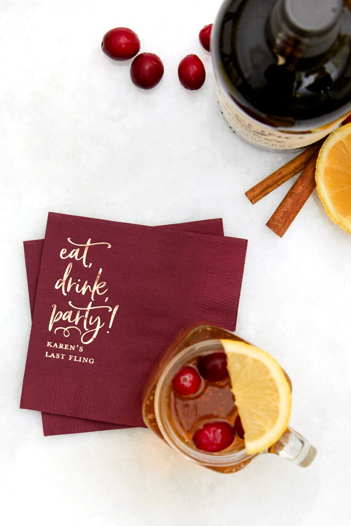 Holiday Whiskey Toddy cocktail recipe with personalized cocktail napkin