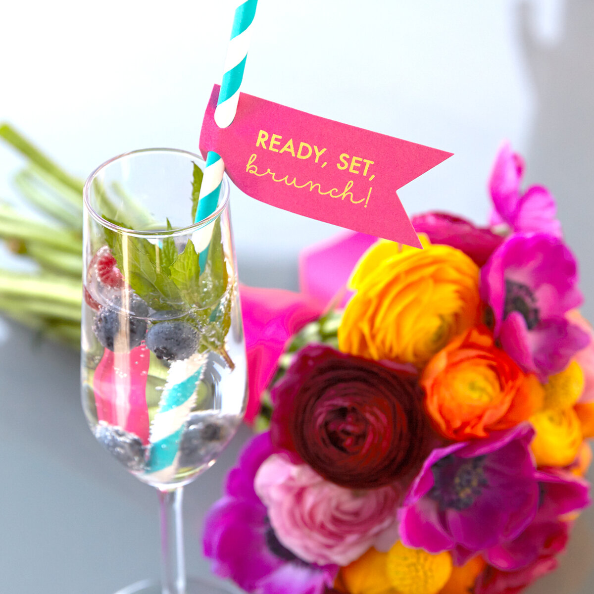 vodka cocktail with la croix and a personalized straw tag