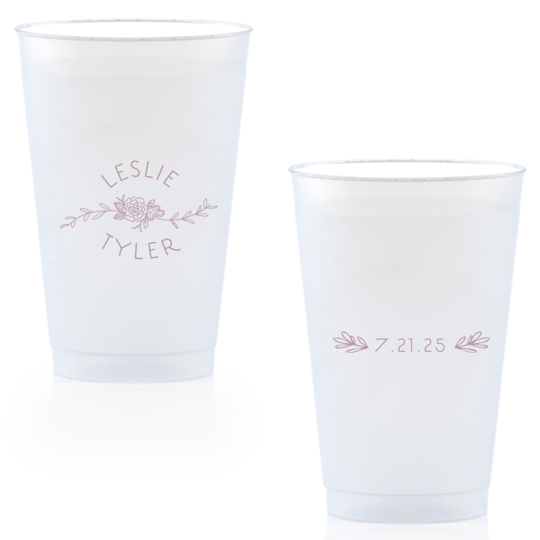 Captivate your guests with the Peony Flourish Names Frosted Cup, featuring a charming heart-leaf flourish and a central peony. This elegantly stacked design beautifully intertwines the couple's names, creating an air of sweet simplicity and sophistication for your memorable celebration.