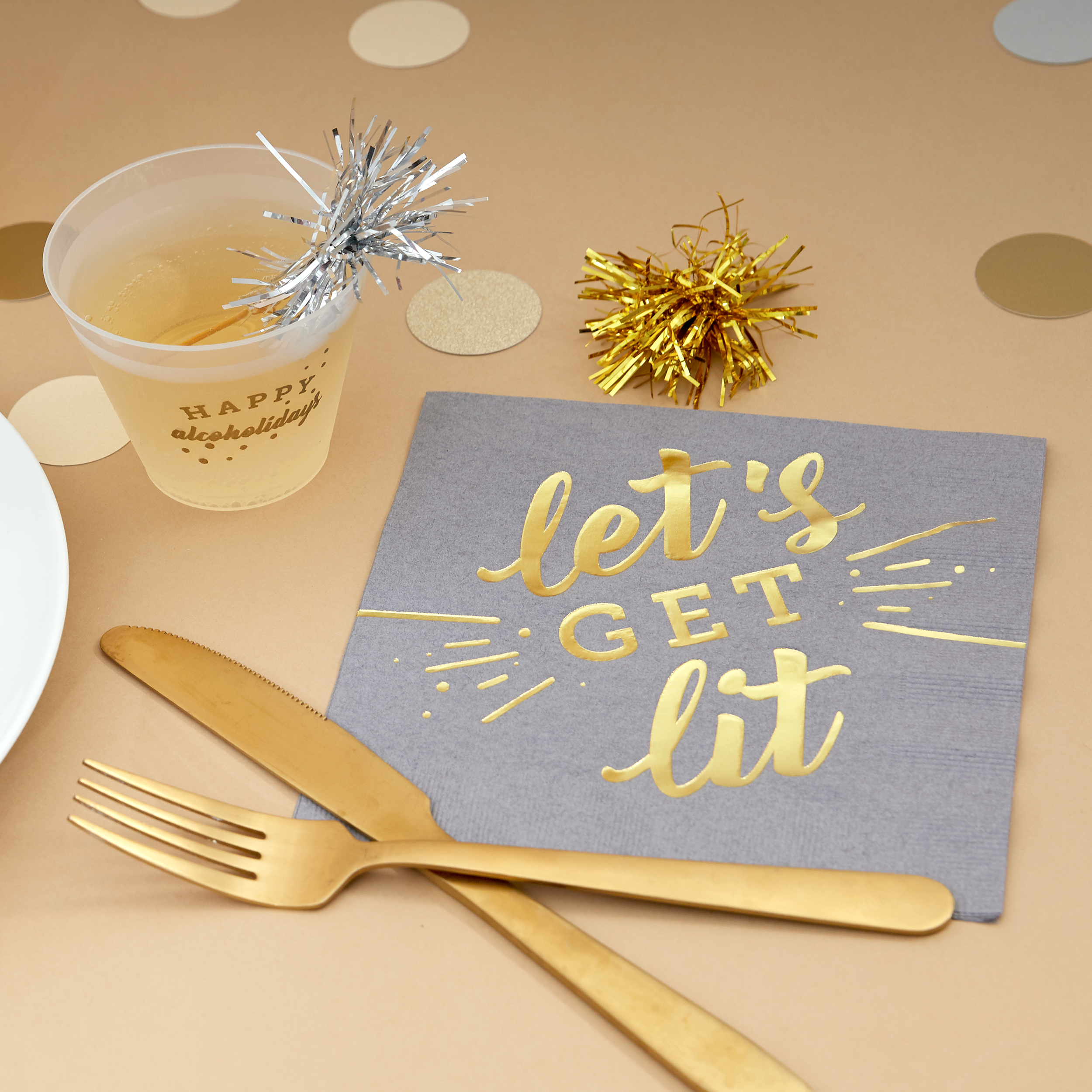 Luncheon napkin styled with forks and cup