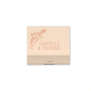 Set the scene for island fun with the Tropical Celebration Match, where vibrant foliage frames the couple's names. Flip for a custom message that whisks guests away to paradise, one striking spark at a time.