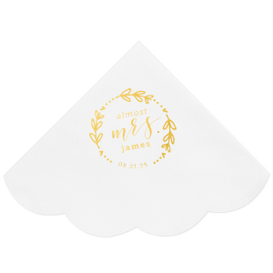 The Almost Mrs Heart Frame Bridal Shower Napkin joyfully heralds the bride-to-be's journey from Miss to Mrs. Encircled by a heart-leaf frame, the flowing, swirling script of "Mrs." takes center stage, accompanied by her soon-to-be last name and the wedding date. A charming, celebratory design!