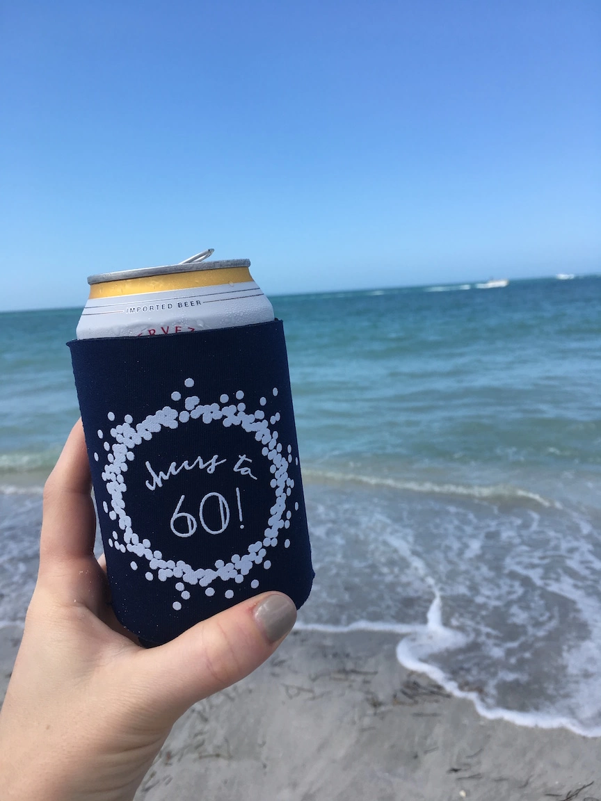 personalized koozie at the beach 