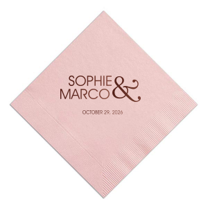The Ampersand Together Napkin showcases a bold, artistic ampersand, symbolizing unity. The couple's names in striking all-caps sit beside it, emphasizing togetherness. Below, the celebration date in smaller print adds a subtle detail, perfect for couples who embody strength and partnership in their union.