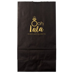 Delight guests with the Ooh Lala Bachelorette Bag, where a glimmering solitaire ring cleverly becomes the 'O' in 'Ooh.' 'Lala' whimsically precedes the bride-to-be's name, making this bag a charming memento of celebration and friendship.