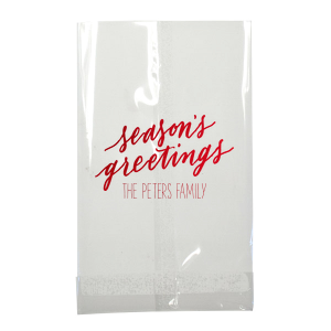 Wrap your presents in the spirit of the season with the Season’s Greetings Holiday Gift Bag, featuring 'season’s greetings' in a gentle script. Below, your family name personalizes this festive carrier, extending a hand of holiday joy with every gift given