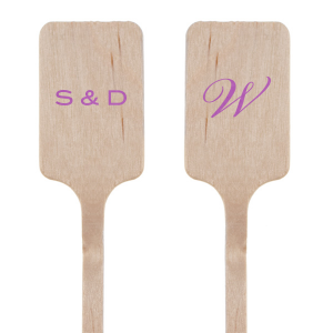 Swizzle in style with the Simple Initials Stir Stick, a playful nod to the newlyweds' names. One side flirts with first initials, while the other seals the deal with a shared surname, stirring up conversation with every sip.