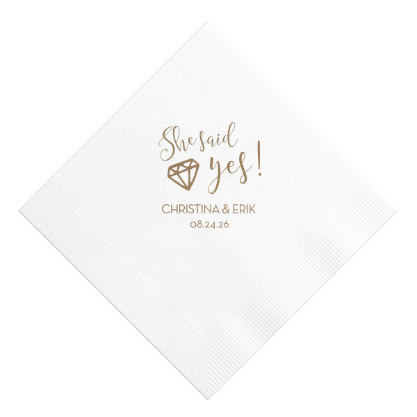With the She Said Yes Diamond Engagement Napkin, let the fun begin! This exuberant design nestles a sparkling diamond into the joyful exclamation, perfect for celebrating a lifetime of love. Personalize with the couple's name and date for an unforgettable celebration.

