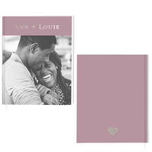 Custom White Portrait Guest Books with Foil with Matte Mauve Ink Digital Print Colors and Shiny Sterling Silver Guest Book Foil has a Solid Heart graphic and is good for use in Wedding, Hearts, Anniversary themed parties and will make your guests swoon. Personalize your party's theme today.