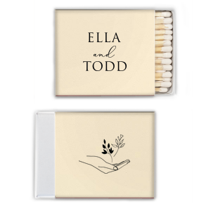 Light up your meaningful moments with the Handheld Floral Names Match. It features bespoke names on the front, while the back displays an open hand cradling tender shoots, symbolizing care and growth. This matchbox is a poetic nod to nurturing new beginnings together. Ideal for weddings and milestone celebrations.