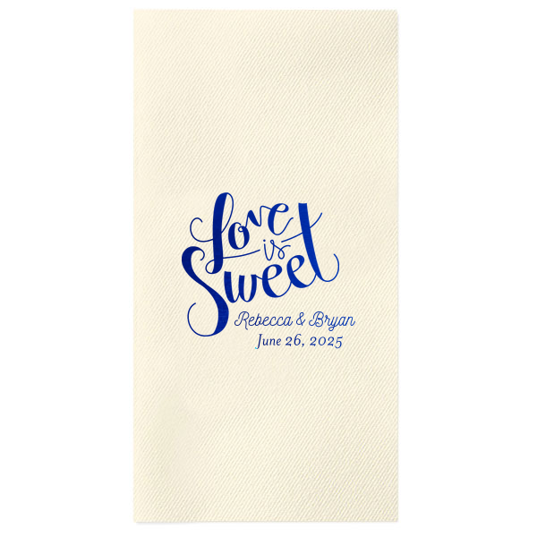 Offer a refined touch to your wedding amenities with the Love is Sweet Guest Towel, where 'Love is Sweet' unfurls in bold, swirling elegance. Below, the newlyweds' names and date serve as a tender reminder of their sweet union, gracing your event with a flourish of affection.