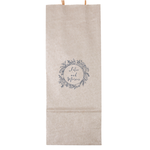 The Regal Wreath Bag design presents an elegant and abundant floral wreath, symbolizing luxury and nature's richness. Enclosed within this lush botanical embrace, the couple's names are elegantly scripted, adding a touch of royal sophistication. This design artfully marries opulence with the charm of natural abundance.