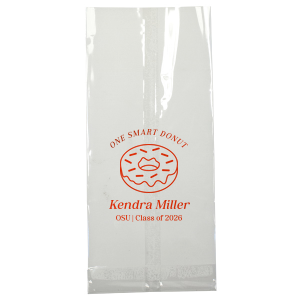 Pack up the celebration with the Clever Donut Grad Bag, tailored with the graduate’s name, school, and graduation year, complemented by a charming donut graphic and the witty phrase “One Smart Donut.” A perfect blend of humor and accolade for their scholastic achievements.