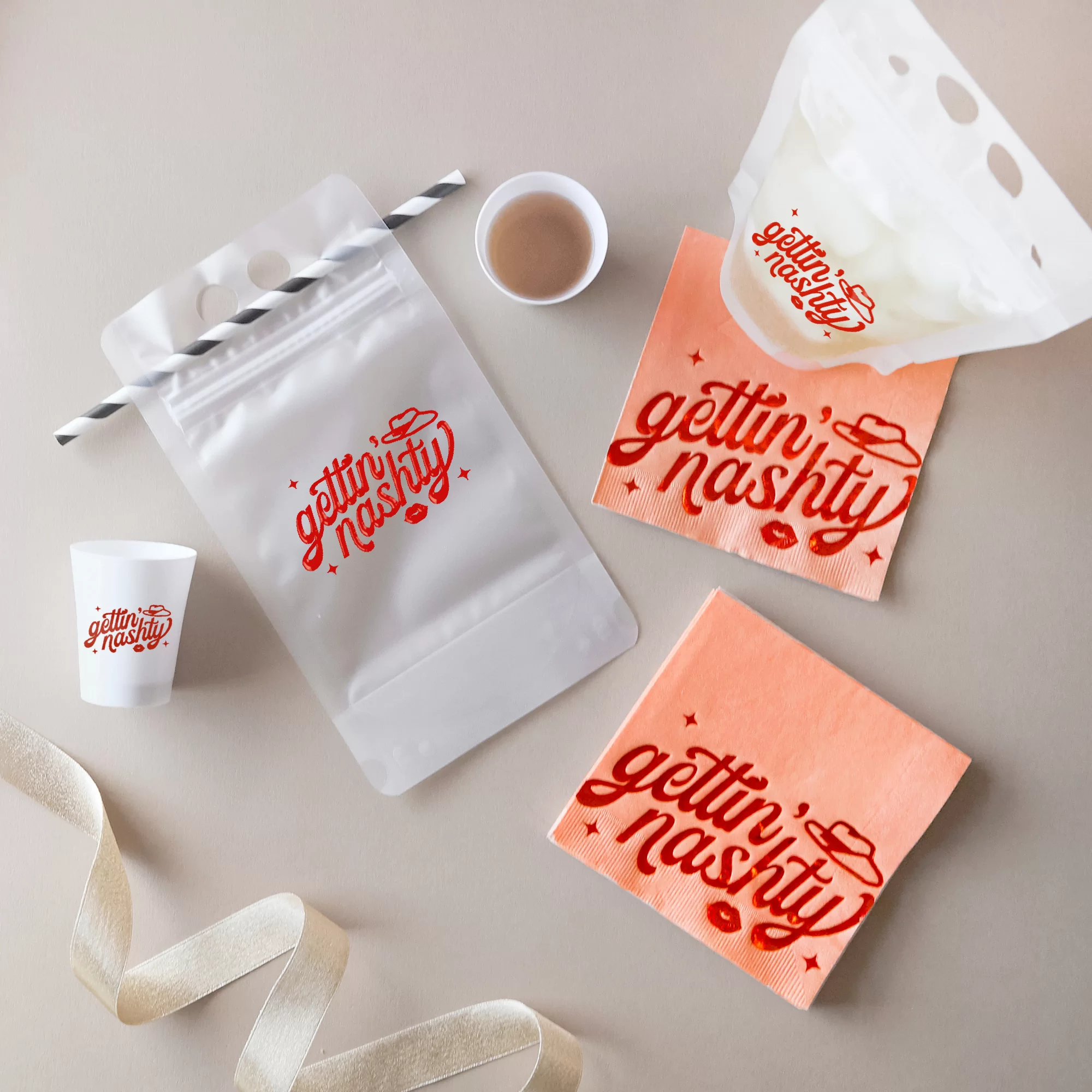 Party scene with drink pouch and shot glasses