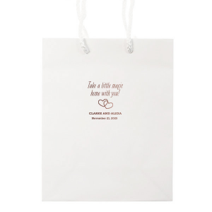 Create wedding details so perfect, they're magical. Customize this goodie bag to send guest home with little party favors or sweet treats. Our Interlocking Hearts graphic will fit any theme. Simply choose your colors and add your names and special date. 