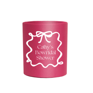 Keep your drinks cool and your style chic at the bridal shower with the Bowridal Shower Can Cooler. Adorn this charming cooler with the bride's name, floating above the whimsical phrase "Bowridal Shower," all encased within an illustrative looping ribbon and bow frame. A playful yet elegant accessory for the celebration.